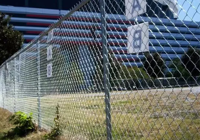 fence top barbed wire